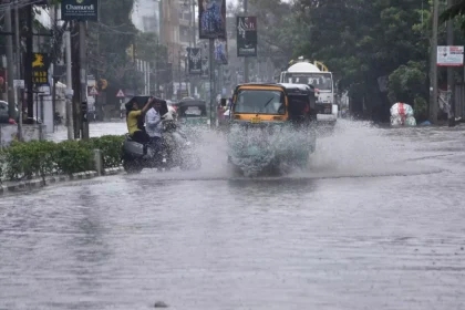 Waterlogged Mumbai road with stranded vehicles due to heavy monsoon rain in Maharashtra