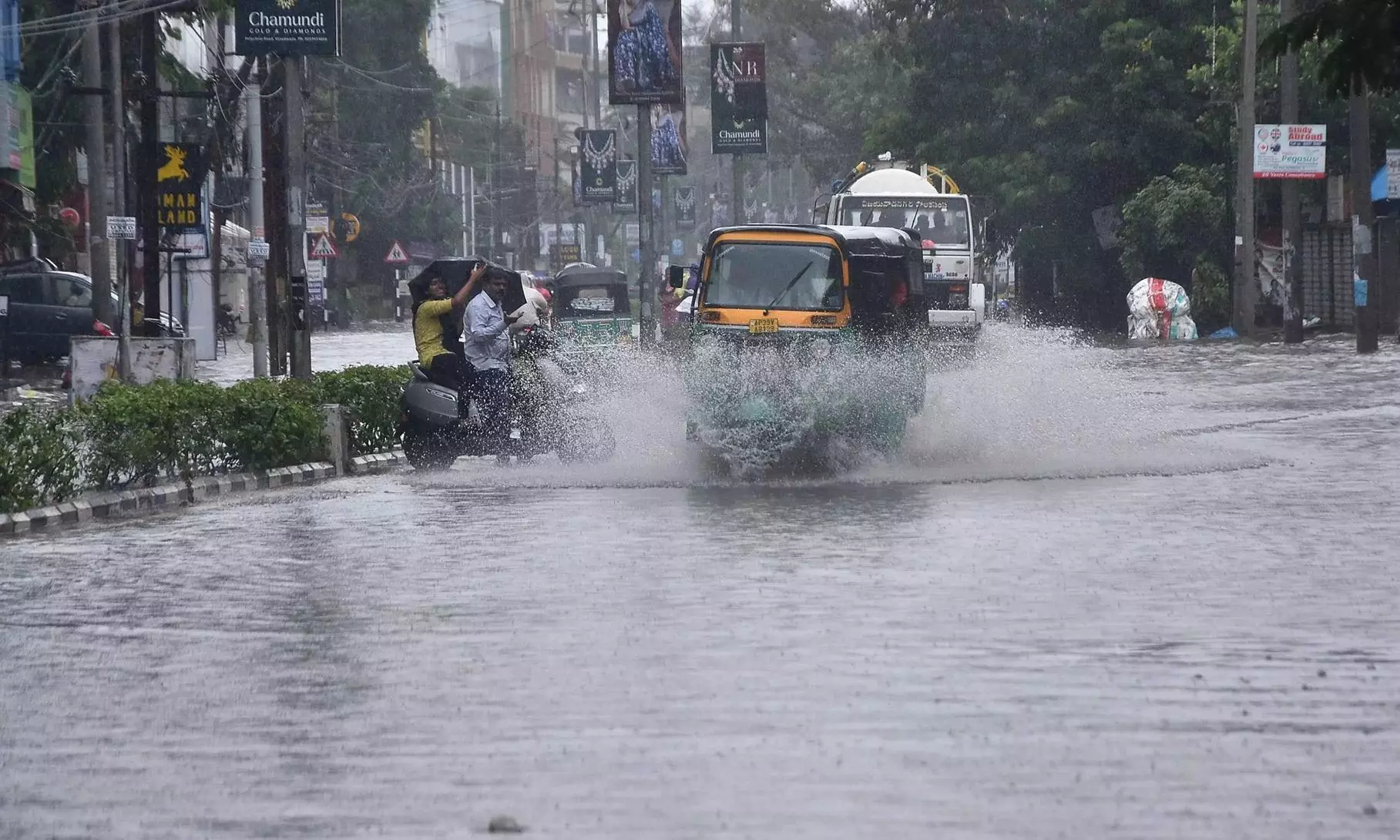 Waterlogged Mumbai road with stranded vehicles due to heavy monsoon rain in Maharashtra