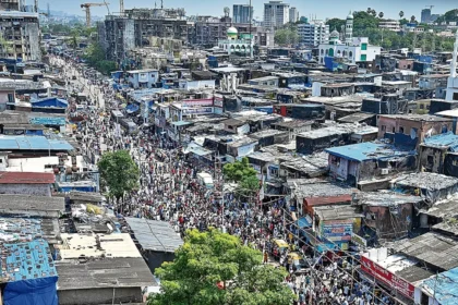 Residents engaging in Dharavi Redevelopment Project survey activities near Kumbharwada
